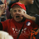 A Trump supporter berates the media as she leaves a campaign rally for Trump, Tuesday, Oct. 18, 2016, in Colorado Springs, Colo. Photo via AP
